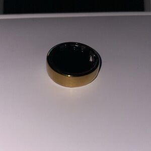 Oura Gold and Black Ring